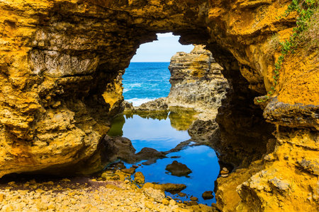 Australia. Great ocean road along the Pacific coast. Picturesque Pacific coast - bays, rocks and arches. The concept of active and automobile tourismの写真素材