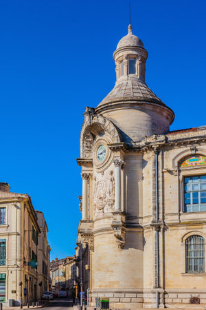 Old clock tower in the Plaza of Nîmesのeditorial素材