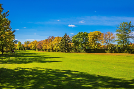 Concept Golf tourism. Phenomenally beautiful park with red, orange and green autumn foliage. Golf Club on the way to Bromont, the French Canadaの写真素材