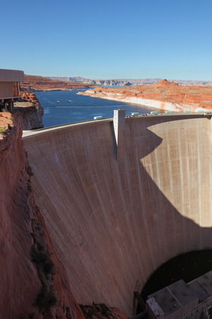 Glen Canyon Dam - the dam on the Colorado River in California. Away - blue water of Lake Powellの写真素材