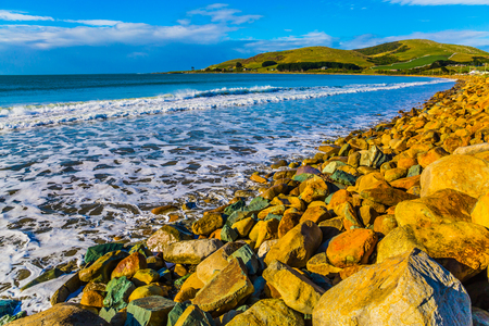Exotic journey to the New Zealand. The stony Pacific coast of the South Island. Concept of active and ecological tourismの写真素材