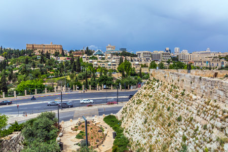 The magnificent white stone Jerusalem illuminated by the autumn sun. Dizzy walk on the walls of...