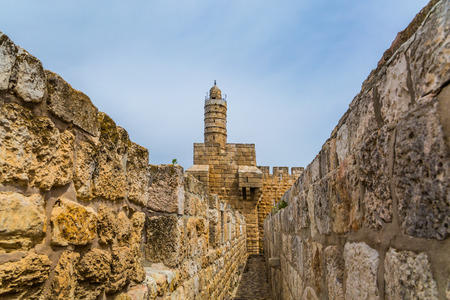 Passage in the wall of Jerusalem. Dizzy walk on the walls of Jerusalem. Eternal Jerusalem. The concept of historical and ethnographic tourismの写真素材
