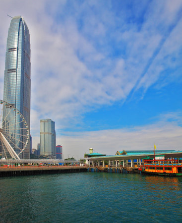HONG KONG, DECEMBER 11, 2014:  Hong Kong Special Administrative Region. The modern city on the ocean coast. Skyscrapers,  Ferris wheel and floating restaurantのeditorial素材