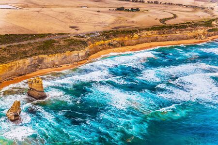 Gorgeous Ocean Turquoise Surf. Helicopter flight. Australia. The Twelve Apostles and Great Ocean Road. The concept of extreme, active and photo tourismの写真素材