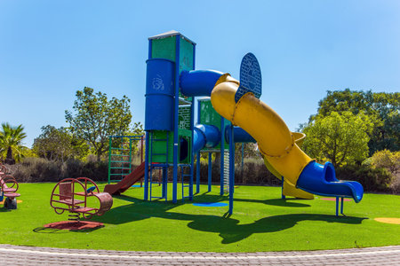 Children playground. A nice summer day. Concept of photo advertising and happy childhood