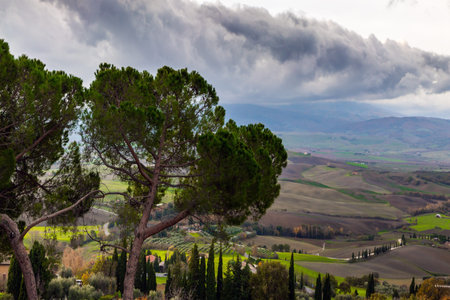 The ancient medieval city is a fortress. Tuscany, Italy. Picturesque rural valley. Concept of active, ecological and photo tourismの写真素材