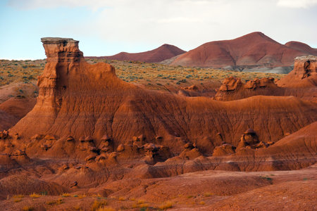 Scenic Utah state park Goblin Valley. USA. Hoodoo - high thin geological formations. Many funny  figures of red-brown sandstone. The concept of active, informative, ecological and photo tourismの写真素材