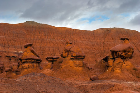 USA. Scenic Utah state park Goblin Valley. The concept of active, ecological and photo tourism. Picturesque huge figures of red-brown sandstone formed as a result of erosionの写真素材