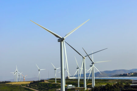 Sunset on Mount Gilboa. Israel. Wind generator. Modern equipment for generating electric energy. The...