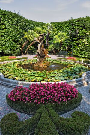 Magnificent park with fountains, statues, flower beds. Lake Como, Villa Carlotta
の写真素材
