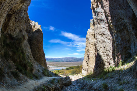 The narrow ravines. New Zealand, South Island. Jagged sharp pinnacles. Clay Cliffs. Sunset....
