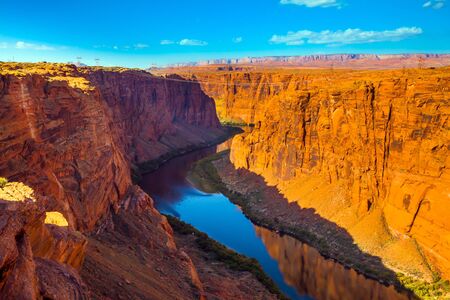 Glen Canyon Dam, Horseshoe Bend - horseshoe-shaped bend of the Colorado River in the Glen Canyon. Travel to the USA. The concept of active, environmental and photo tourismの写真素材