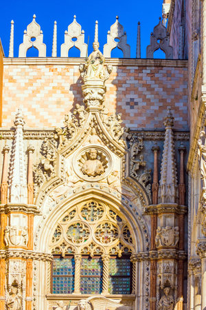 Magnificent decorated window of the Palazzo Ducale. Doge's Palace is a great monument of Italian Gothic architecture. Magical journey to Venice. The concept of photo tourismのeditorial素材