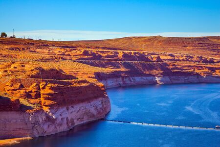 Best journey in life. Glen Canyon Dam, Arizona, in the Grand Canyon Gorge. The largest reservoir in the United States of artificial origin is Lake Powell. Concept of active and photo tourismの写真素材