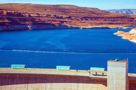 The largest reservoir in the United States of artificial origin is Lake Powell. Glen Canyon Dam across the Colorado River. Best journey in life. Concept of active, ecological and photo toursmの写真素材