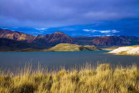 Huge lake with azure water, arid steppe of Patagonia and the steep slopes of cold mountains. Los...