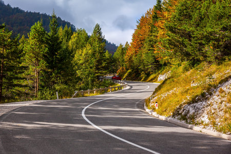 Golden Autumn in Slovenia. Magnificent Julian Alps, mountain range, spur of the Alps. Sunset, a big...