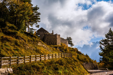Ancient ruins on a steep mountainside. Sunset. Spur of the Julian Alps. Golden Autumn in Slovenia. Europeの写真素材