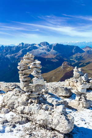 Commemorative stone pyramid. Pordoi is a mountain pass of the Dolomites. South Tyrol. Italy. The Passo-Pordoi pass separates the province of Trento from the province of Belluno.の写真素材