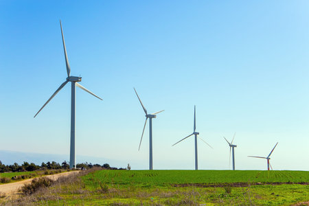 The wind farm consists of several scenic wind turbines. Warm winter in Israel. Gilboa - mountain...