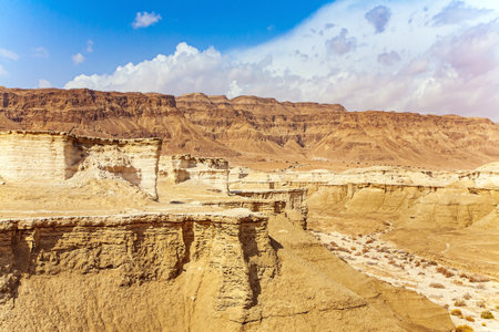 The Judean Desert. Interesting walk among picturesque hills, cliffs and gorges. Magnificent exotic resort for treatment. Ancient mountains and deserts around the Dead Sea. Israel.の写真素材