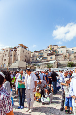 JERUSALEM, ISRAEL - NOVEMBER 16, 2011: Thousands of Jews pray at the Old City of Jerusalem. The square in front of Western Wall. The symbol of faith and hope fo Jews. Big Jewish holiday.のeditorial素材