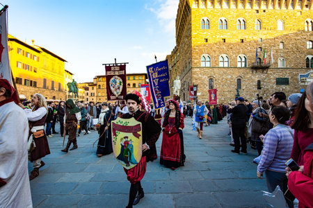 FLORENCE, ITALY - NOVEMBER 30, 2019: Carnival participants and enthusiastic spectators. Great...
