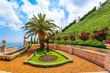 Pilgrimage center and popular tourist destination. Haifa, Israel. The slope of Mount Carmel. Bahai World Center. Gorgeous colorful gardens, palm trees and flower bedsの写真素材