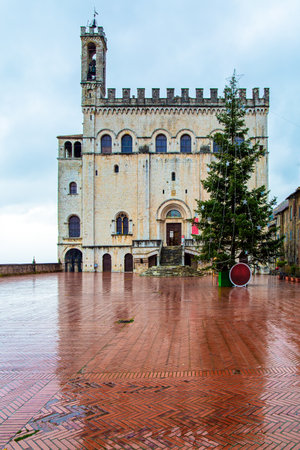 Consular palace. The antique city of Gubbio with a rich history and grandiose architecture. The city is located in the Umbrian mountains.Piazza Grande is the city center. Rainy day. Italyのeditorial素材