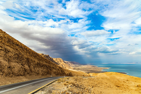 The Dead Sea. The highway runs along the coast of the Dead Sea. Cloudy and warm January day. Israel....