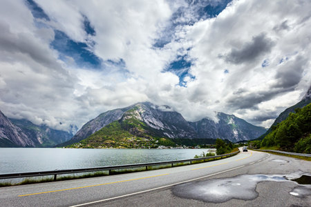 Scenic road in the mountains of Western Norway. Summer, July. Scandinavia. Beginning of the Hardangerfjord. Magical journey in the cold northern country.の写真素材