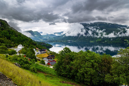 Beginning of the Hardangerfjord. Scenic road in the mountains of Western Norway. Scandinavia. Magical journey in the cold northern country. Summer, Julyの写真素材