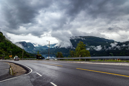 Scenic road in the mountains of Western Norway. Magical journey in the cold northern country. Beginning of the Hardangerfjord. Scandinavia. Summer, Julyの写真素材