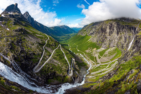 Sunny summer day in the mountains of Norway. Photo taken from a drone. The famous mountain serpentines on a tourist camper. The famous "Troll Staircase" .の写真素材