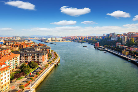 Portugalete, the district of Bilbao. Basque country. The famous unique outboard ferry. Flying ferry across the Nervion River. Photo taken from a bird's eye view. European exotic.の写真素材