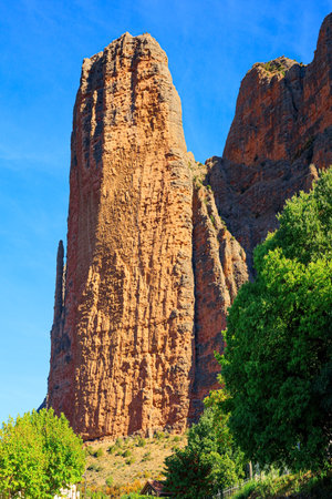Part of the foothills of the Pyrenees. The magnificent Mallets of Riglos is a conglomerate of rock formations. Hoya de Huesca, Aragon. Romantic trip to Spain.の写真素材