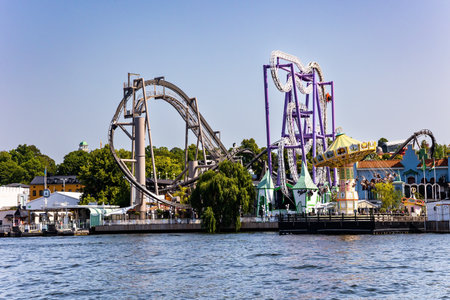 Amusement park on the island of Djurgarden. Sweden. Hot summer day in Stockholm. Boat trip along the historical canals of Stockholm.の写真素材