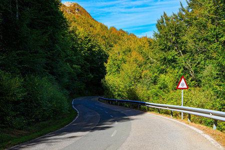 Gorgeous road from San Sebastian to Tolosa. Basque country, province of Guipuzcoa, Spain.  Lush colors of autumn. Warm sunny autumn dayの写真素材