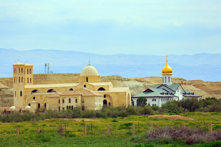 Religious buildings on the Israeli coast. Gilded dome of the church with an Orthodox cross. Qasr el Yahud. Place of the Baptism of Jesus Christ on Jordan River in Israel - Bethabara.の写真素材