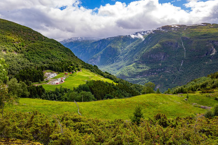 Incredible trip to the north of Norway. The mountains are covered with patches of last year's snow. Huge sharp rocks overgrown with moss.の写真素材