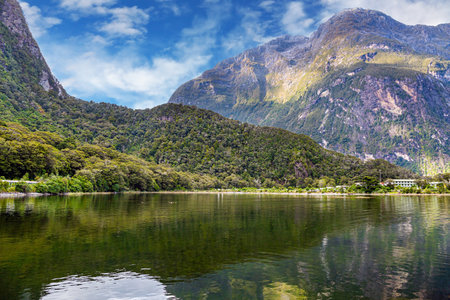 The fjord Milford Sound. The mountains and the narrow winding water bay create beautiful landscapes.  The magical nature of the southern hemisphere. New Zealand. South Island.の写真素材