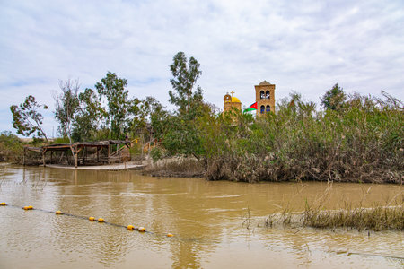 The Jordan River - state border between Israel and Jordan. Place of the Baptism of Jesus Christ on theJordan River in Israel - Bethabara. Qasr el Yahud.の写真素材