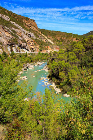 The river Gallego flows through the gorge. The magnificent Mallets of Riglos. Beautiful rocks - part of the foothills of the Pyrenees. Aragon. Romantic trip to Spain.の写真素材