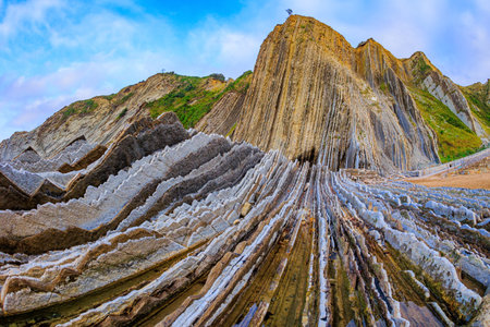 The most unusual  beach in the Basque Country - Itsurun. Flysch - unique landscape of underwater rocks exposed at low tide. Magical landscape.の写真素材
