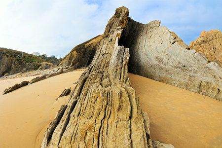Incredible rock formations, stones and boulders. Cantabria, Spain. The Playa de la Arnia beach.の写真素材