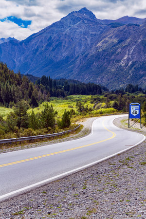 The road passes through picturesque landscapes. Argentina. Fields and mountains surround the famous highway 40. Travel to South America.の写真素材