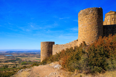 Loarre Castle is a Spanish fortress in the province of Aragon. Sunrise. Autumn trip to Spain. The Spanish defensive structure was built a thousand years ago.のeditorial素材