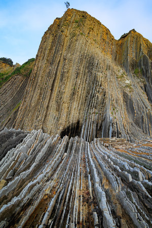 Magical unique landscape. Coast of the Bay of Biscay, Atlantic. The coastline here is defined by a geological formation called the Flysch. The unusual beach in the Basque Country - Itsurunの写真素材