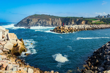 Magnificent Atlantic Ocean. Picturesque fishing port of the city of Luarca in the bay. Romantic trip to Spain. Asturias.の写真素材